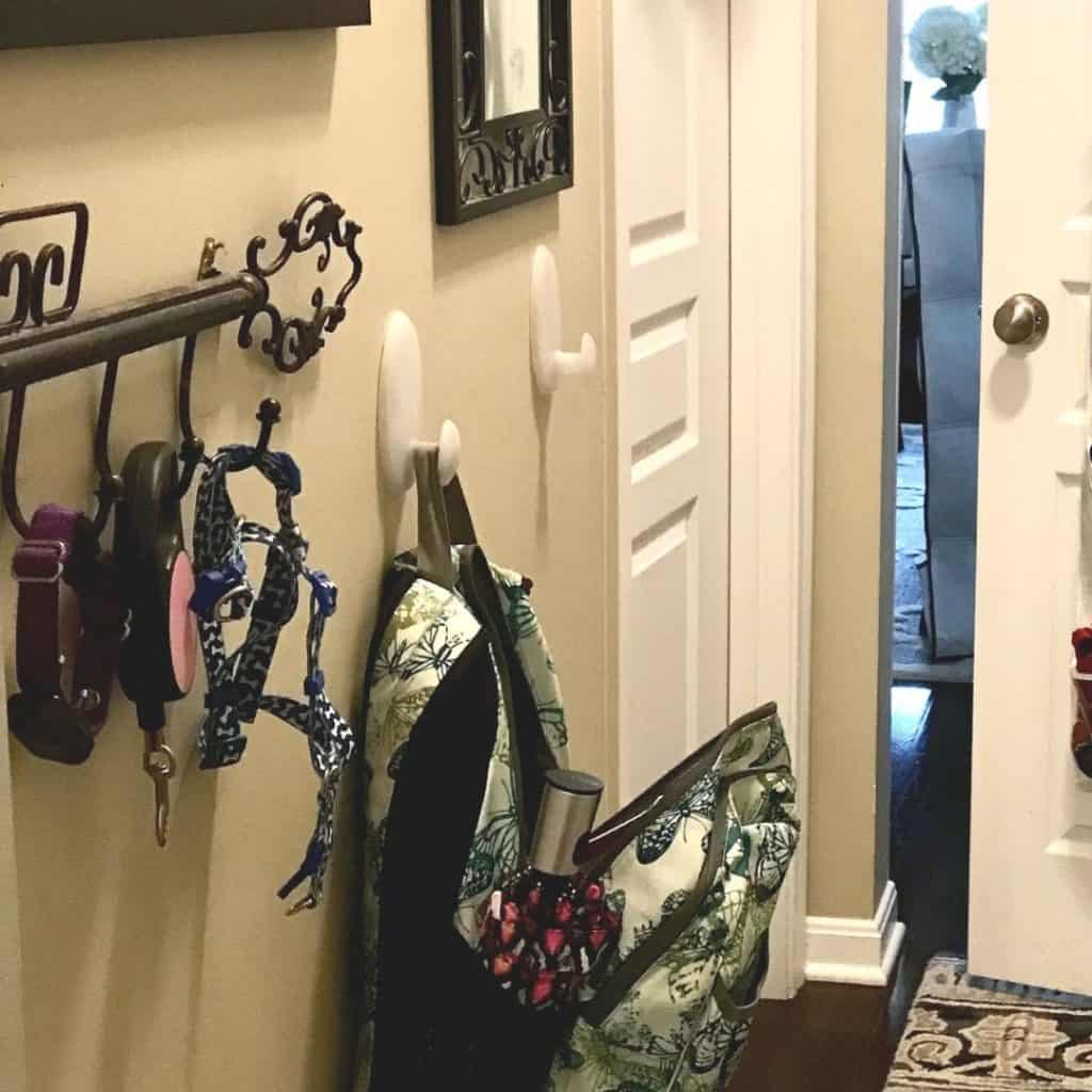 turning closet into mudroom with book bag haning on hook