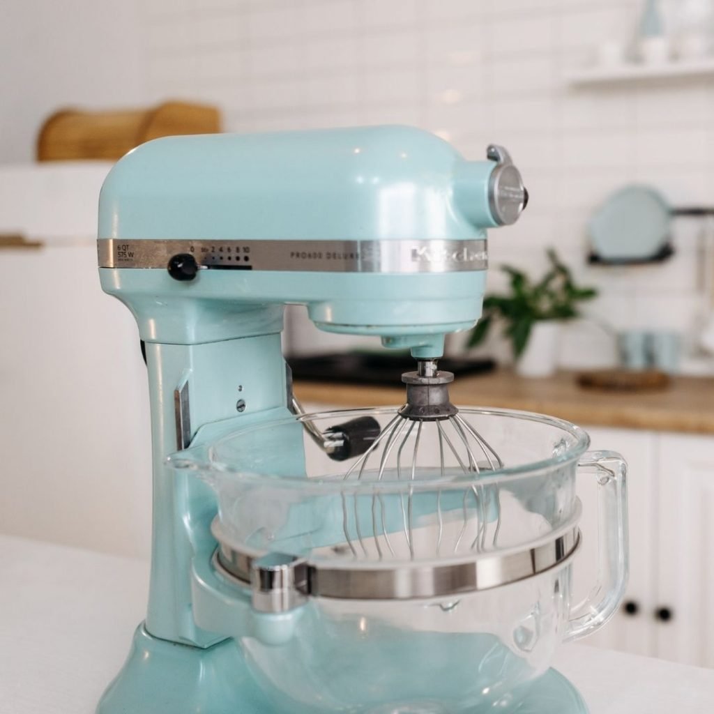 aqua colored mixer on kitchen countertop