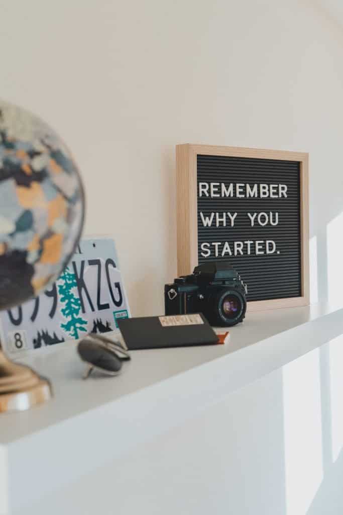 framed sign that says remember why you started