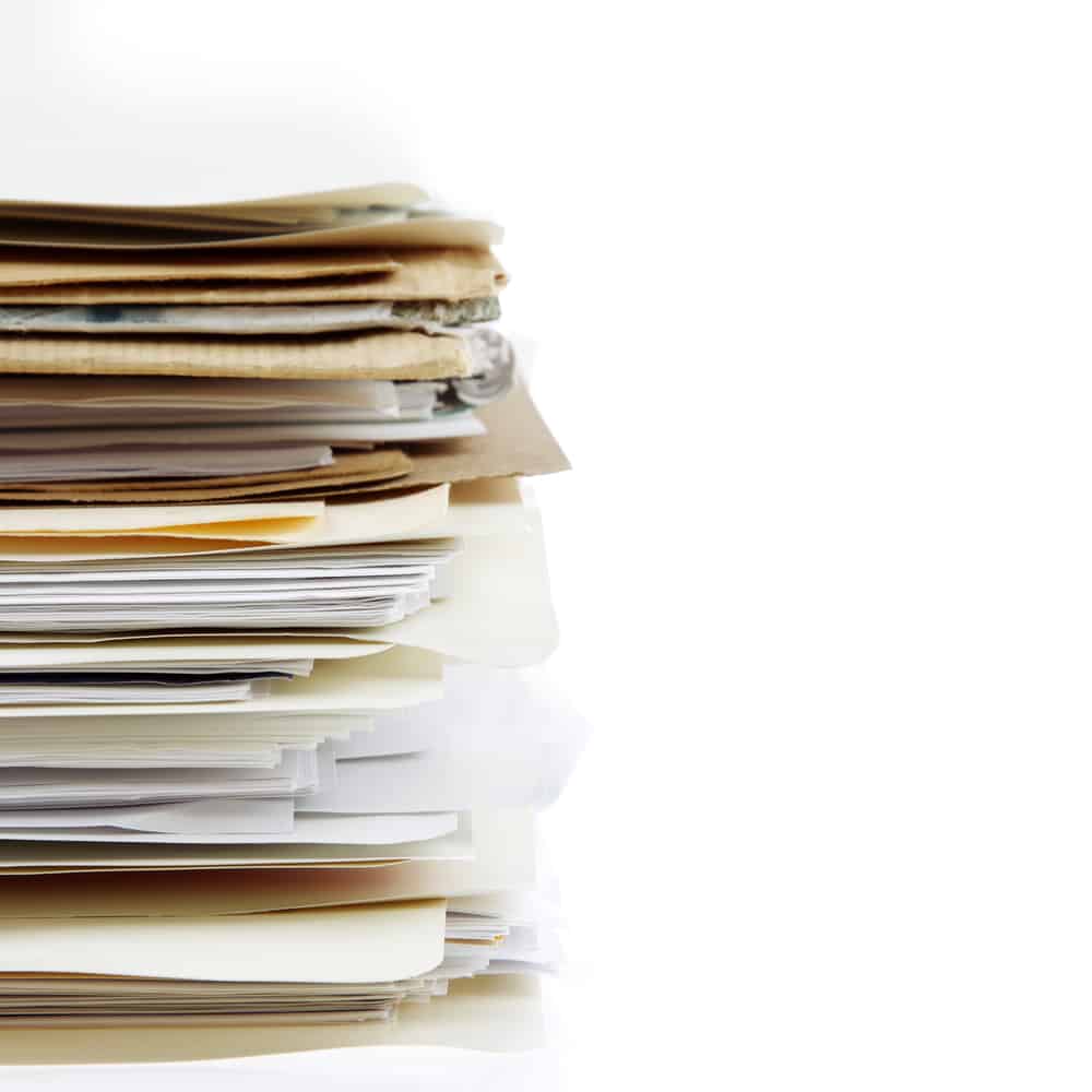 how to declutter paper piles