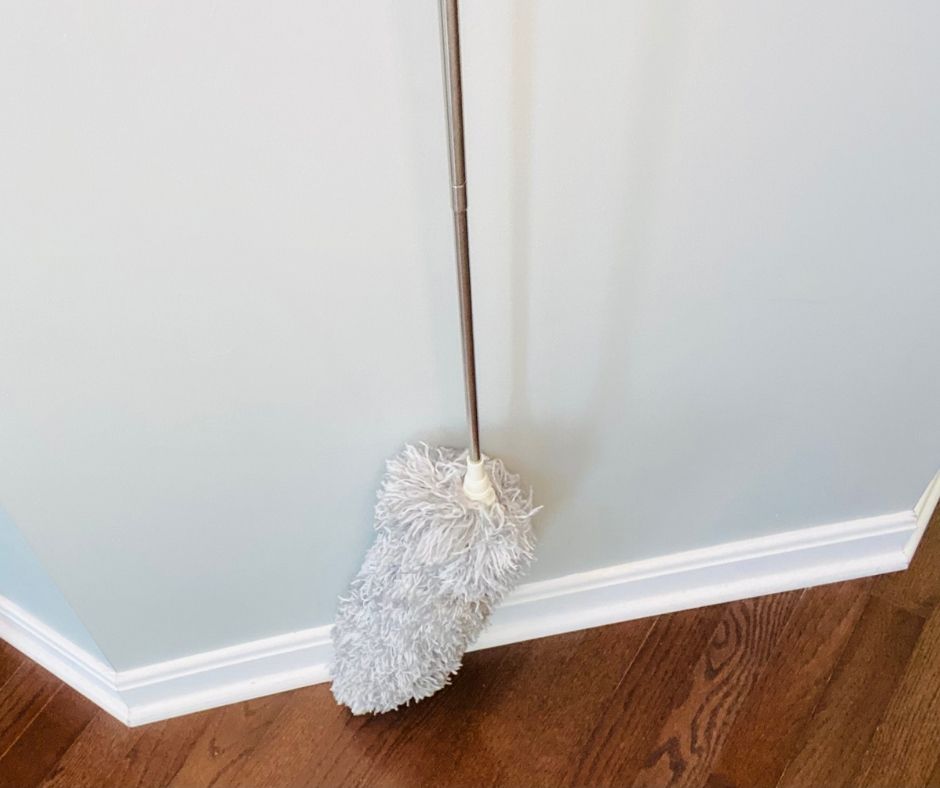 telescopic microfiber duster to clean baseboards without bending over