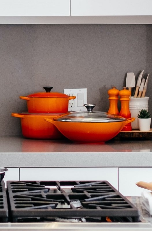 take pots and pans off kitchen countertops to declutter your space