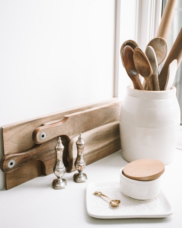 take utensil holders off kitchen countertops to declutter your space