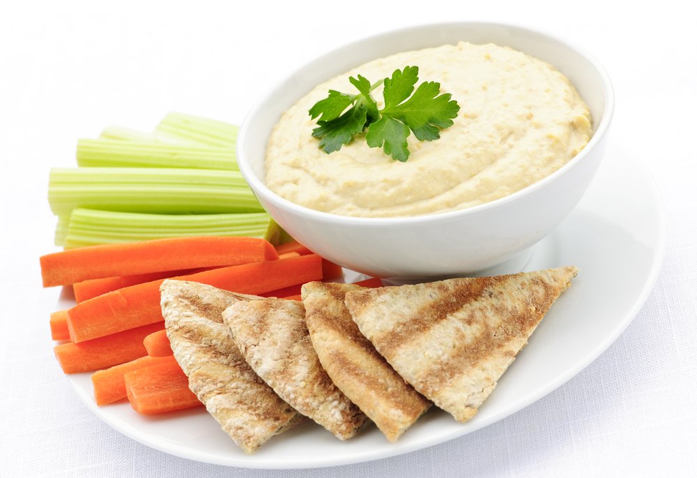 plate of mom snacks veggies and hummus and pita bread