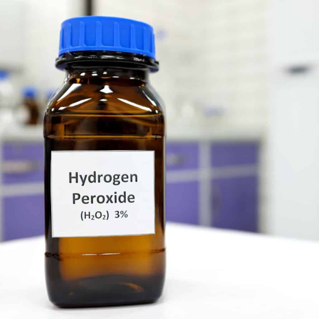 brown hydrogen peroxide bottle with blue cap
